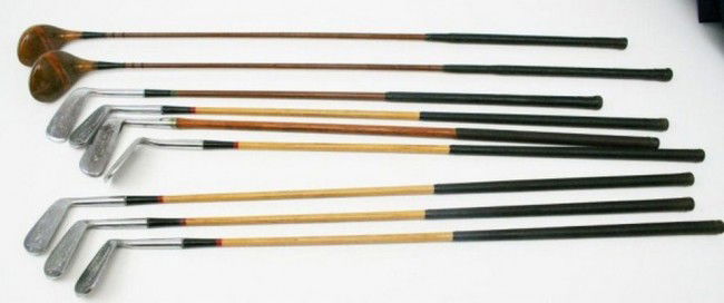 VINTAGE GOLF CLUBS KRO-FLIGHT & CALAMITY JANE ETC: VINTAGE GOLF CLUBS KRO-FLIGHT & CALAMITY JANE ETC A mixed bag of wood and "wood look" shaft golf clubs including Spalding Kro-Flite 2, 4, 5, 7, 9 irons, Calamity Jane model putter, Spalding 2 & 3 wood