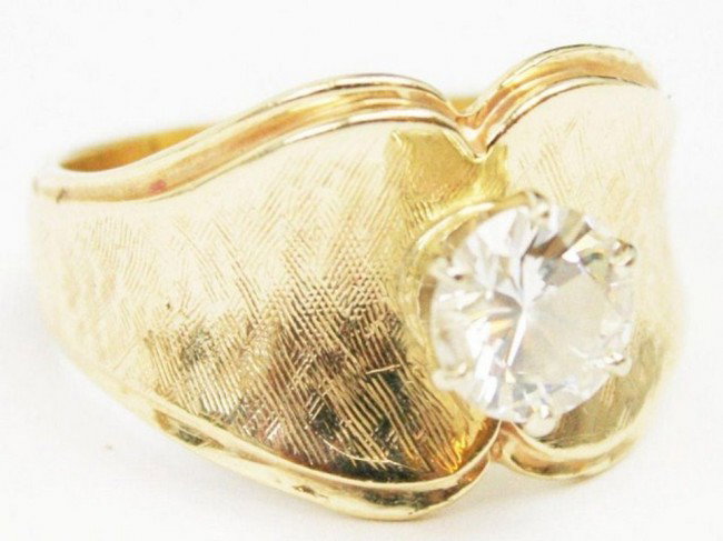 14K YELLOW GOLD RING WITH 1.12CT SOLITARE DIAMOND: 14K YELLOW GOLD RING WITH 1.12CT SOLITARE DIAMOND An elegant and simple ladies 14k gold ring with a 1.12 carat brilliant round solitaire diamond having measurements of approximately 6.78-6.83mm diamet