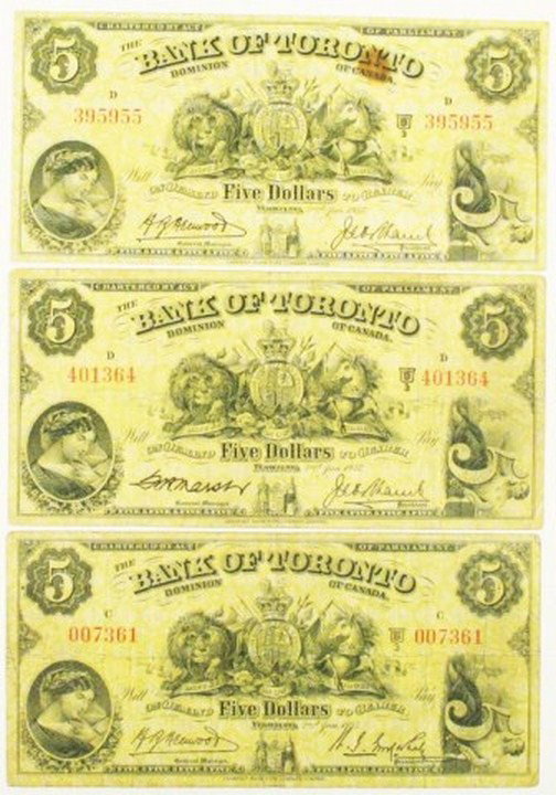 CANADA NOTES - BANK OF TORONTO $5 BILL LOT OF 3: CANADA NOTES - BANK OF TORONTO $5 BILL LOT OF 3 1935, 007361, Plate C, about VF; 1937, 401364, plate D, about VF; 1937, 395955, plate D, about F with brown stain above "Canada". All ungraded. Conditio