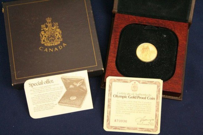 CANADA - 1976 MONTREAL OLYMPICS GOLD PROOF $100: CANADA - 1976 MONTREAL OLYMPICS GOLD PROOF $100 1976 Canadian Olympic Gold Proof Coin in 22K gold of Standard fineness - .9166. Pure Gold content - 15.5517g. Weight - 16.9655g. Diameter - 25mm. Ref: K
