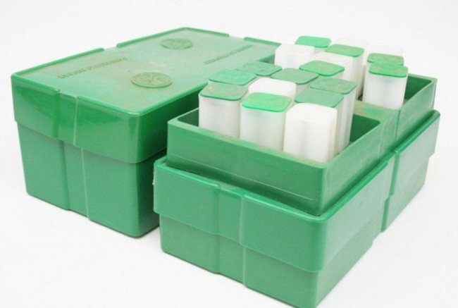 SILVER EAGLE DOLLAR COIN PLASTIC ROLLS & CASES: SILVER EAGLE DOLLAR COIN PLASTIC ROLLS & CASES Plastic holders for rolls of eagles. This lot consists of 68 plastic rolls and two complete treasury boxes. (Please note that there are no coins included