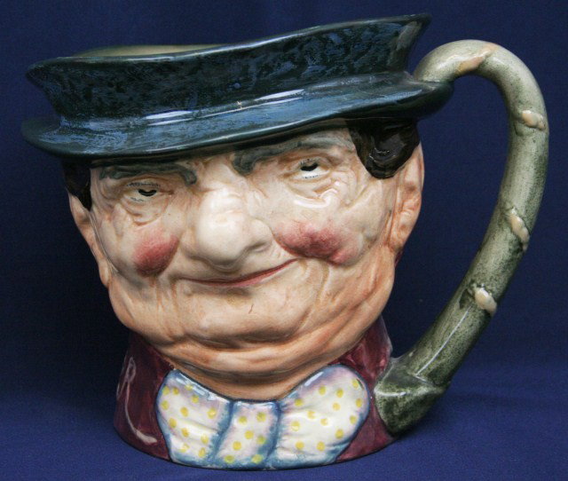 ROYAL DOULTON MUSICAL TOBY MUG, "TONY WELLER": Royal Doulton Musical Toby Jug, modeled as Tony Weller, the base containing a Thorens music box movement activated when the jug is lifted, ht. 6 1/2 in.