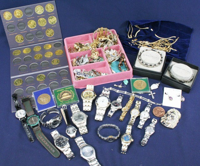 HUGE COSTUME JEWELRY WATCHES TOKEN LOT: HUGE COSTUME JEWELRY WATCHES TOKEN LOT Huge lot of costume jewelry to include, gold filled necklaces and earrings, 2 pounds of other costume jewelry (kenneth cole, Lori Bonn, Napier and others. 26 wat