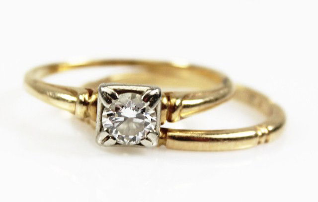 14K YELLOW GOLD & .5CT DIAMOND WEDDING RING SET: 14K YELLOW GOLD & .5CT DIAMOND WEDDING RING SET Set of two rings. The wedding band with pattern accents. The engagement ring has a .5ct round brilliant cut diamond, contained in a white gold, square s