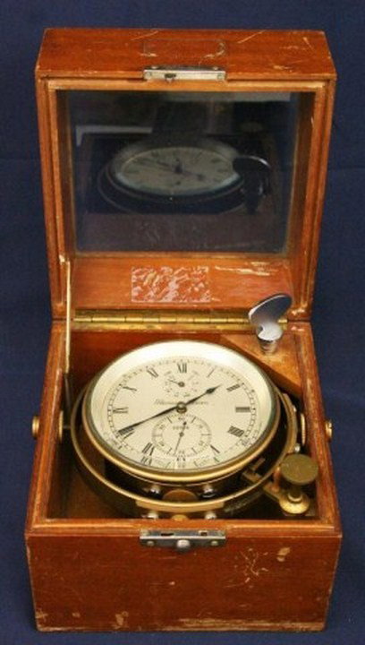 THOMAS MERCER TWO DAY MARINE CHRONOMETER: Two Day Marine Chronometer by Thomas Mercer, St. Albans, England, No. 22026, with Roman numeral dial, second hand and up-and-down dials, blued steel hands, fusee movement and brass case. Mounted in a 