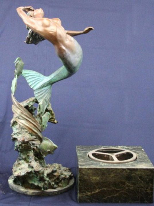 LARGE BRONZE MERMAID STATUE JERRY JOSLIN: A large bronze statue of a mermaid by Jerry Joslin. Piece is titled "Rapture of the Deep." Signed by the artist and marked as being #7 of only 30 made. Stands 31" tall and is on a 6" rotating base.
