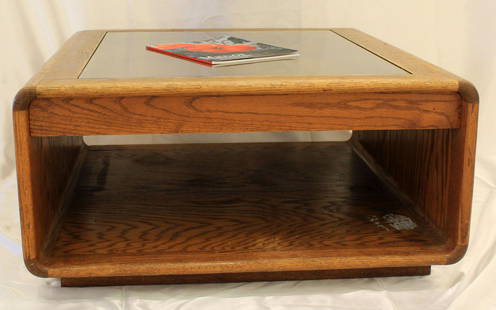 LOU HODGES 1978 GLASS TOP COFFEE TABLE WITH DRAWER: Oak frame table with glass top and slide out drawer to reveal contents from top. Lou Hodges classic design. - Properly signed with stamped manufacturer's mark tounderside. 31x31x16" See also pair of c