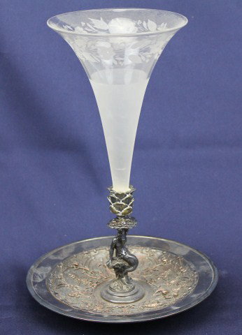 ART NOUVEAU AND EPERGNE GLASS PIECE: ART NOUVEAU AND EPERGNE GLASS PIECE Epergne art nouveau vase on top of a plated silver base. Size: 11" Condition: VGC Est.$50-150