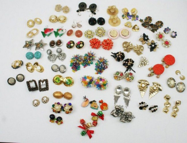 LARGE LOT COSTUME JEWELRY EARRINGS: LARGE LOT COSTUME JEWELRY EARRINGS Over 30 pairs of costume jewelry earrings with at least one pair of Kirks Folly and Monet. Various sizes, colors and shapes. A few missing stones or backings. Condit