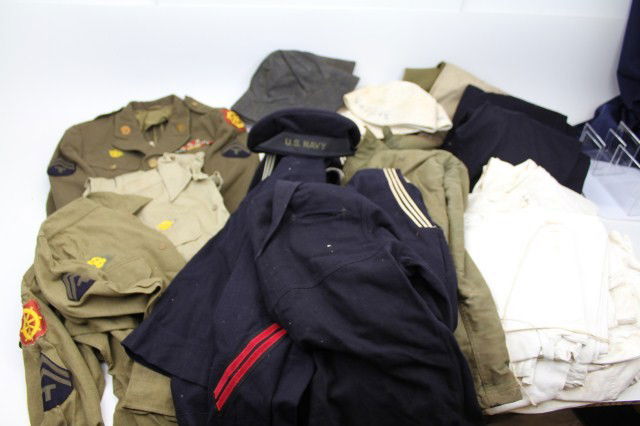 LARGE LOT OF MOSTLY WWII US NAVY UNIFORM: LARGE LOT OF MOSTLY WWII US NAVY UNIFORM A large and varied lot including cold weather jackets. Service dress blues and whites. Fatigues. Hats, shoes and more. Also includes a WWII US Army service dre