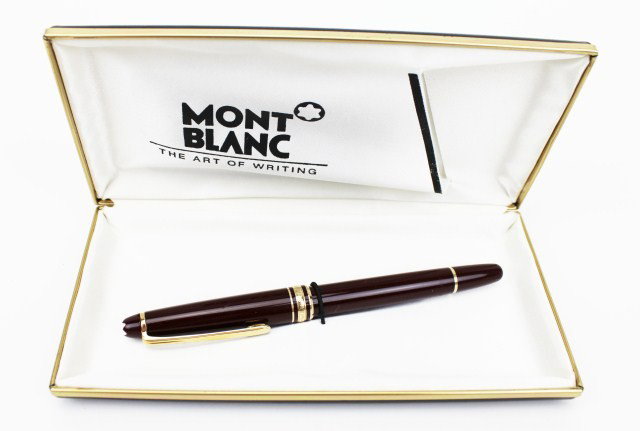 MONTBLANC MEISTERSTUCK CLASSIQUE FOUNTAIN PEN: MONTBLANC MEISTERSTUCK CLASSIQUE FOUNTAIN PEN Montblanc Meisterstuck Classique fountain burgundy and gold pen. "M" numbered 4810 14K gold nib with plated gold clip and rings with emblem on cap in orig