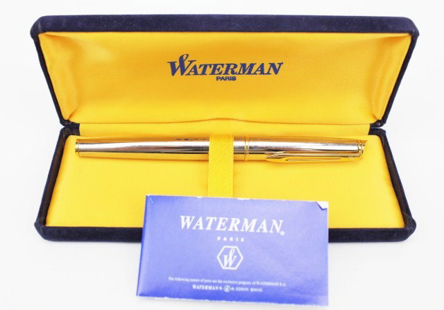 WATERMAN PARIS HEMISPHERE FOUNTAIN PEN: WATERMAN PARIS HEMISPHERE FOUNTAIN PEN Waterman Hemisphere stainless steel and 23K gold trim fountain pen. Nib marked "F" comes with paperwork in original box. Size: 5.375 Condition: VGC Est.$75-150