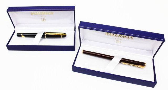 2 WATERMAN PHILEAUS & APOSTROPHE FOUNTAIN PENS: 2 WATERMAN PHILEAUS & APOSTROPHE FOUNTAIN PENS Waterman fountain pens; Phileaus black with gold trim measuring 5.375" marked "M" on the nib. Apostrophe cherry with gold trim measuring 5.5" marked 18K 
