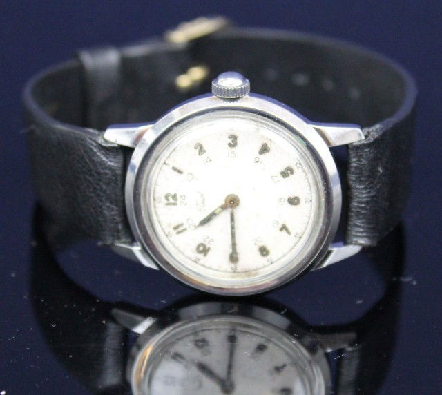 TISSOT MILITARY DIAL MENS WRIST WATCH: TISSOT MILITARY DIAL MENS WRIST WATCH 17 jewels. 12/24hr dial. 1942. Serial number 1462874. Serviced. Leather strap. Weight: NA Size: 25mm dial Condition: GC Est.$150-300