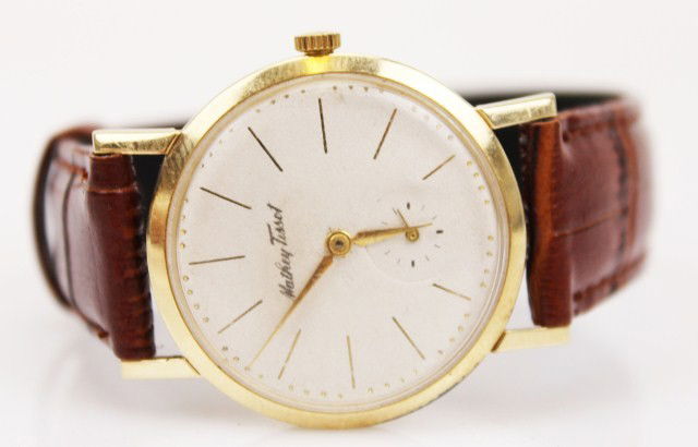 MENS MATHEY TISSOT 14K GOLD CASE WRIST WATCH: MENS MATHEY TISSOT 14K GOLD CASE WRIST WATCH A 17 jewel, 14K yellow gold dress watch by Mathey Tissot. Case #47085. Recently serviced. Replaced leather strap. Weight: 27.6g total Size: 23mm Dial Condi