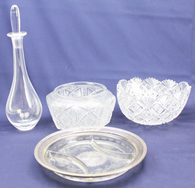 SMALL LOT OF ASSORTED GLASSWARE: SMALL LOT OF ASSORTED GLASSWARE This lot includes Orrefors decanter, two ornate glass bowls, and a glass plate with a silver rim. Large bowl has 9" diameter, decanter is 14" tall, and plate has a 10.5