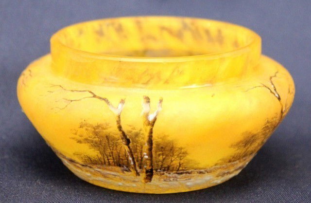 DAUM NANCY SNOW SCENE GLASS VASE: DAUM NANCY SNOW SCENE GLASS VASE A beautifully decorated Daum Nancy glass vase depicting a forest winter scene. Signed "Daum Nancy," have the initials "M.L.," and the Cross of Lorraine on the bottom o