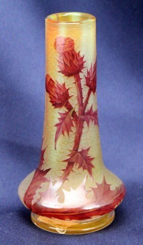 DAUM NANCY THISTLE CAMEO GLASS VASE: DAUM NANCY THISTLE CAMEO GLASS VASE Daum Nancy cameo glass vase with thistle design. The side of the vase is signed in cameo script "Daum Nancy" and has the Cross of Lorraine. Size: 4.5" tall Conditio