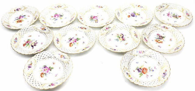 SET OF 12 MEISSEN RETICULATED SALAD PLATES: SET OF 12 MEISSEN RETICULATED SALAD PLATES These salad plates have reticulated rims with a floral and gold encrusted motif. The floral designs on the center of the plate pop with color. The mark on th