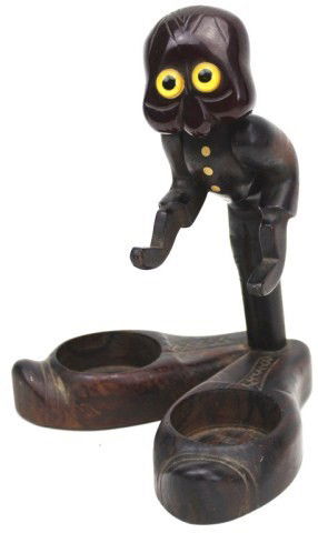 DUNHILL YZ NUTBIRD WOOD & BAKELITE FIGURE: DUNHILL YZ NUTBIRD WOOD & BAKELITE FIGURE Art Deco YZ Nutbird. Cartoon figure with outsized shoes and hands outstretched. There head is a red bakelite. Hands rotate around the shoulder and the figure