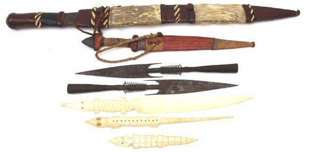 MIXED LOT OF AFRICAN WEAPONS & BONE FIGURES: MIXED LOT OF AFRICAN WEAPONS & BONE FIGURES Two metal fishing spear points, a knife and a short sword. Together with three bone carved crocodile figures. Size: Various Condition: GC Lot: 15362