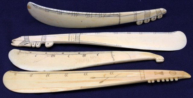 ALASKAN WALRUS TUSK SCRIMSHAW PAGE TURNERS: ALASKAN WALRUS TUSK SCRIMSHAW PAGE TURNERS Four carved and scrimshawed ivory page turners. Early 20th century. Size: 10" Condition: GC Lot: 15390