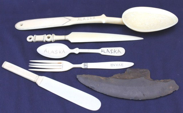 ALASKAN WALRUS TUSK IVORY & SCRIMSHAW TOOLS: ALASKAN WALRUS TUSK IVORY & SCRIMSHAW TOOLS A mixed lot of tools including, spoons, fork, knife, letter opener, and a slate scraper. Some with "Alaska" type scrimshaw. Size: up to 12" Condition: VGC L