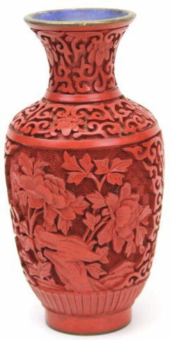 CHINESE CINNABAR LACCQUERED VASE: CHINESE CINNABAR LACCQUERED VASE A Chinese cinnabar lacquered vase. Intricately carved floral design. Size: 6" Condition: VGC Lot: 15446