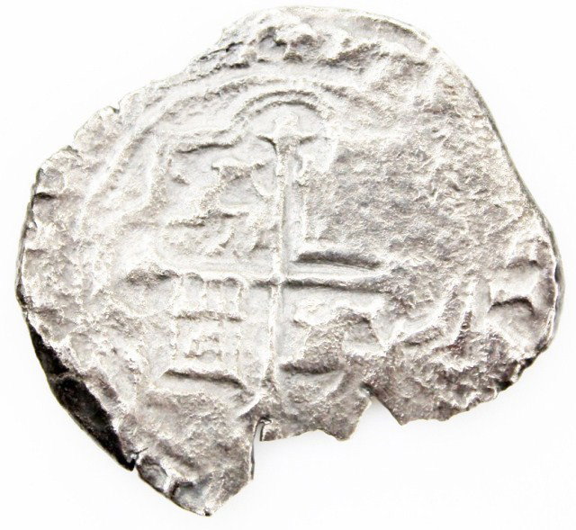 CONSOLACION 1681 SPANISH SHIPWRECK 8 REALES COB: CONSOLACION 1681 SPANISH SHIPWRECK 8 REALES COB Reputedly found at the wreck site of the Consolacion. 8 Reales silver shipwreck coin. 15.4g. 38mm max. No certificate. Condition: as found Lot: 15598