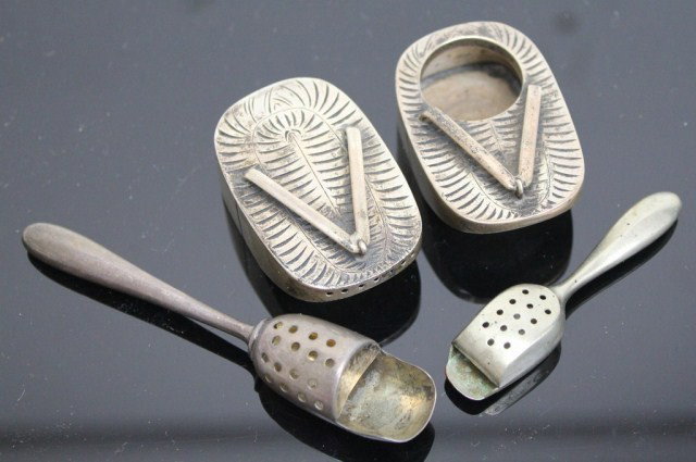JAPANESE STERLING SILVER SALT & PEPPER SANDALS: JAPANESE STERLING SILVER SALT & PEPPER SANDALS Japanese Sterling Silver Salt Pepper Sandal shakers in "950 silver" (both are so marked). Together with two strainers, one is marked "sterling". Weight 5