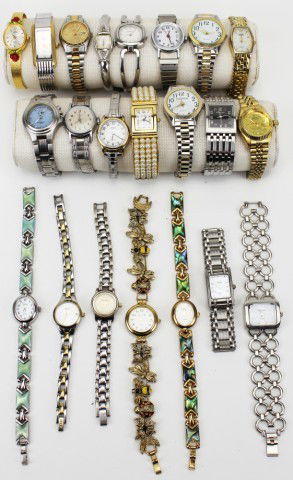 LOT OF 22 LADIES WRISTWATCHES: LOT OF 22 LADIES WRISTWATCHES Lot of 22 ladies wristwatches of various makes and sizes. Featuring Elgin, Kenneth Cole, Fossil, Eddie Bauer, Timex, Vivani, Anne Klein, Vanity Fair, Waltham, Sarah Coven