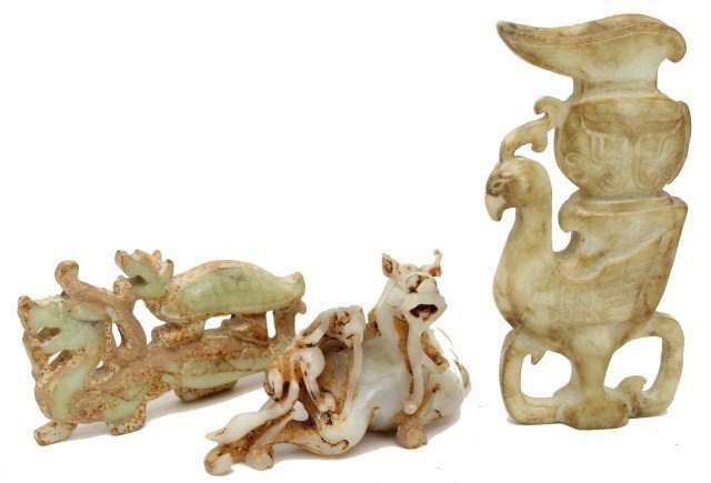 MIXED CHINESE WHITE JADE LOT OF 3: MIXED CHINESE WHITE JADE LOT OF 3 Light green/white jade lot of three. Stylized dragon and tiger. Another similar and a votive bird carrying a vessel. Size: The votive piece is 6" tall Condition: VGC 
