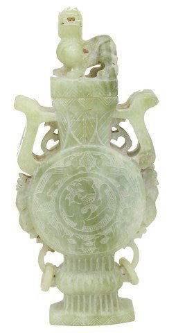 CHINESE CARVED JADE URN WITH FOO DOG FINIAL: CHINESE CARVED JADE URN WITH FOO DOG FINIAL A nicely carved jade urn with primitive dragon figures and a foo dog top piece and intertwined hanging rings. Size: 10.5" Condition: VGC Est. 100-200 Lot 18