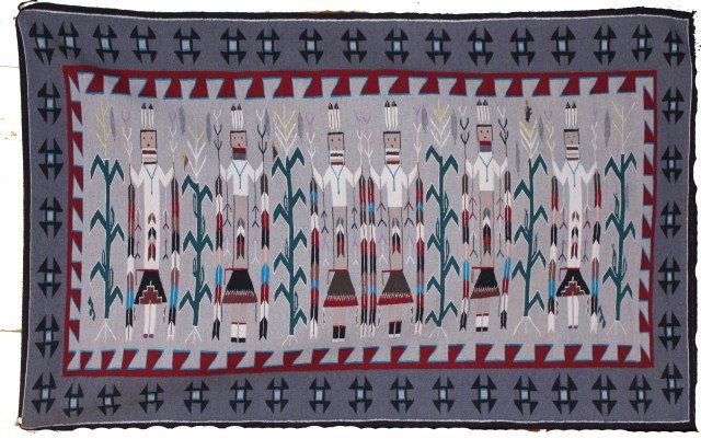NAVAJO YEI TEECNOSPAS RUG BY MARY JOE: NAVAJO YEI TEECNOSPAS RUG BY MARY JOE Hand woven by Mary Joe Navajo Yei from Teec Nos Pas rug. Black border rug of six ceremonial dancers in between corn stalks. Size: 57 x 91" Condition: VGC Est. 800