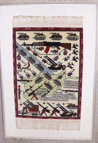 AFGHANI WAR RUG FRAMED: AFGHANI WAR RUG FRAMED Framed Afghani war rug from 1990. Stated on the rug reads "Finally the Soviet Union satanic treason has come to an end." Made on occasion of Russian aggressors final defeat in A
