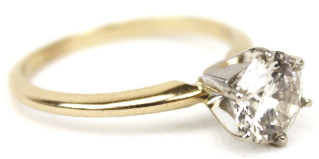 LADIES 1.24 CT DIAMOND SOLITAIRE ENGAGEMENT RING: LADIES 1.24 CT DIAMOND SOLITAIRE ENGAGEMENT RING Approximately a 1.24 ct diamond prong set in a 14K gold solitaire setting, yellow gold band with white gold prongs. Diamond is approximately I-1 clarit