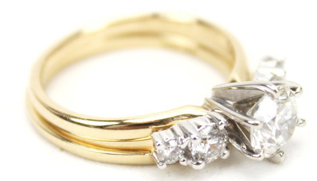 LADIES 14K GOLD 1.4 CT. DIAMOND ENGAGEMENT RING: LADIES 14K GOLD 1.4 CT. DIAMOND ENGAGEMENT RING A stunning ladies engagement ring and enhancer. In like-new condition is a beautiful solitaire ring having a prong-set round 1.02 ct. diamond of approxi