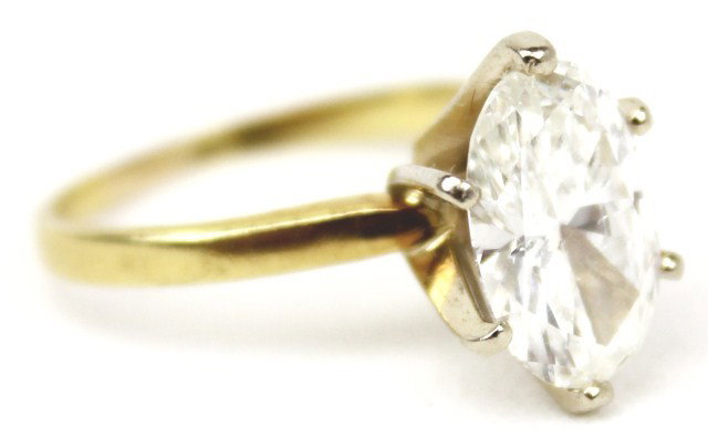 LADIES 18K GOLD OVAL DIAMOND SOLITAIRE 2 CTS: LADIES 18K GOLD OVAL DIAMOND SOLITAIRE 2 CTS Approximately a 2.02 carat oval diamond in an 18K gold solitaire setting. Diamond is approximately I-1 clarity and G color. Accompanied by a September 2011