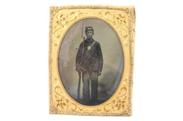 CIVIL WAR CONFEDERATE SOLDIER AMBROTYPE & TINTYPE: CIVIL WAR CONFEDERATE SOLDIER AMBROTYPE & TINTYPE Ambrotype of a Civil War Confederate soldier standing in uniform with musket, bayonet fitted. This together with a tintype of a lady reputed to be his