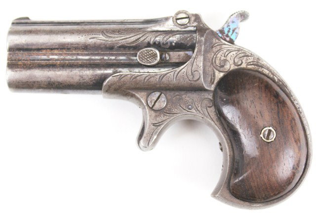 REMINGTON FACTORY ENGRAVED DERRINGER PISTOL: REMINGTON FACTORY ENGRAVED DERRINGER PISTOL .41 rimfire over/under Derringer. Factory engraved. Some original blue remains. About 85%. With some minor rust. Bore i9s good. SN4359. Manufacturer / Type: