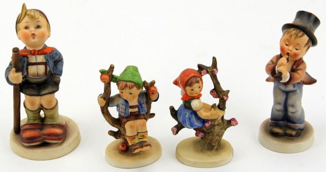 4 HUMMEL FIGURES TMK 2 & 3 #85 17 141 142: 4 HUMMEL FIGURES TMK 2 & 3 #85 17 141 142 Lot of 4 Hummel figures including; "Serenade" #85/0 is a TMK with blue bee and incised circle. "Little Hiker" #17/1, "Apple Tree Girl" #141, and "Apple Tree B
