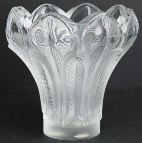 LALIQUE ESNA PATTERN VASE: LALIQUE ESNA PATTERN VASE This Lalique clear glass vase is comprised of a feather motif. The circumference of the vase features alternating sizes of highly ornate feathers. Signed on the bottom. Size: