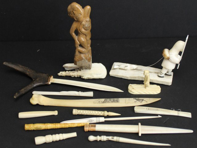 MIXED LOT OF ALASKAN IVORY & BONE ITEMS: MIXED LOT OF ALASKAN IVORY & BONE ITEMS A mixed lot of Ivory and bone items including a hunter, signed. A bone ancestral figure with a child. A skier, A bone knife, an antler handled knife, various to