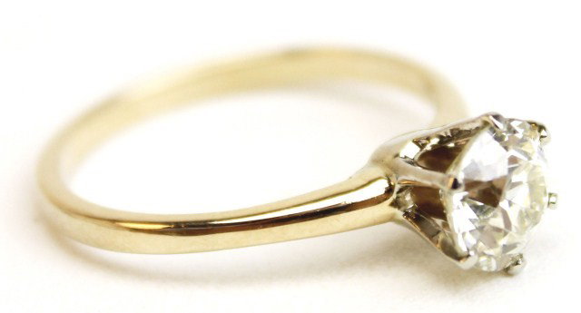 14K GOLD 1.44 CT DIAMOND SOLITAIRE ENGAGEMENT RING: 14K GOLD 1.44 CT DIAMOND SOLITAIRE ENGAGEMENT RING Stunning ladies 14K yellow gold diamond solitaire engagement ring. Approximately a 1.44 ct old European cut diamond of VS-2 clarity and M color. Acco