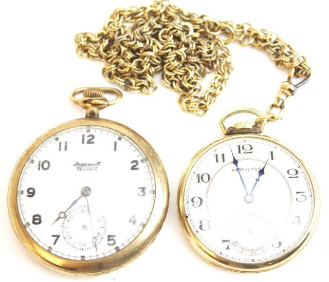 GOLD FILLED POCKET WATCHES HAMILTON & INGERSOLL: GOLD FILLED POCKET WATCHES HAMILTON & INGERSOLL A lot of 2 pocket watches to include Hamilton gold-filled pocket watch with Fob and an Ingersoll. Both open face. Both are non-working and require parts