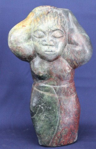 JOSEPH NDANDARIKA - STONE CARVING SCULPTURE: JOSEPH NDANDARIKA - STONE CARVING SCULPTURE Joseph Ndandarika (Zimbabwean, 1941-1991). Woman washing her hair stone sculpture, signed at the base. A member of the Shona tribe, Ndandarika was the grand