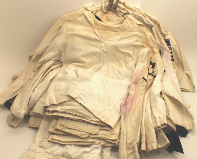 UNIFORM - 17 US NAVY ENLISTED DRESS WHITES: UNIFORM - 17 US NAVY ENLISTED DRESS WHITES Mostly with trade patches and rank. WW2 and later. Stained, some heavily. Size: Various Condition: VG or better EST. 100-300