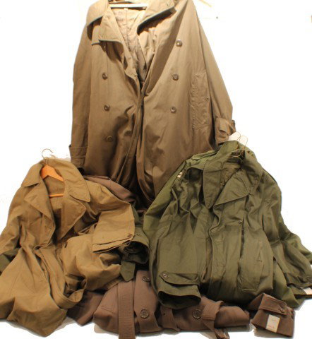 14 US ARMY OFFICERS & ENLISTED MANS TRENCH COATS: 14 US ARMY OFFICERS & ENLISTED MANS TRENCH COATS Mixed lot of 14 WW2 and later trench coats. Officers and enlisted. Size: Various Condition: VG or better EST. 100-300