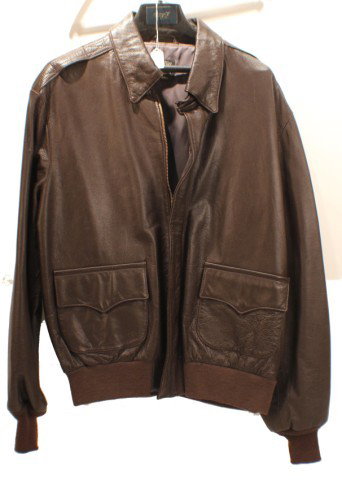 UNIFORM - US AVIATOR A2 TYPE LEATHER JACKET: UNIFORM - US AVIATOR A2 TYPE LEATHER JACKET Leather flight jacket, type A2. Size 46. Willis & Gieger inc. Size: Various Condition: VG or better EST. 100-200