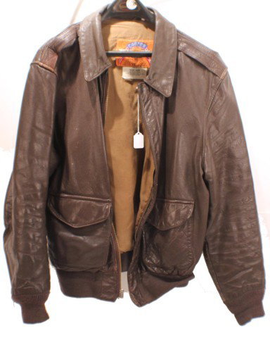 UNIFORM - US AVIATOR A2 TYPE LEATHER JACKET: UNIFORM - US AVIATOR A2 TYPE LEATHER JACKET Leather flight jacket, type A2. Size 42R. Cooper Sportswear MFG Co. Size: Various Condition: Light wear. Good EST. 100-200